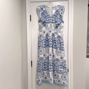 NWT Sleeveless Dress with blue embroidery.
